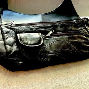 Chic Black Leather Shoulder Bag with Slouchy Style